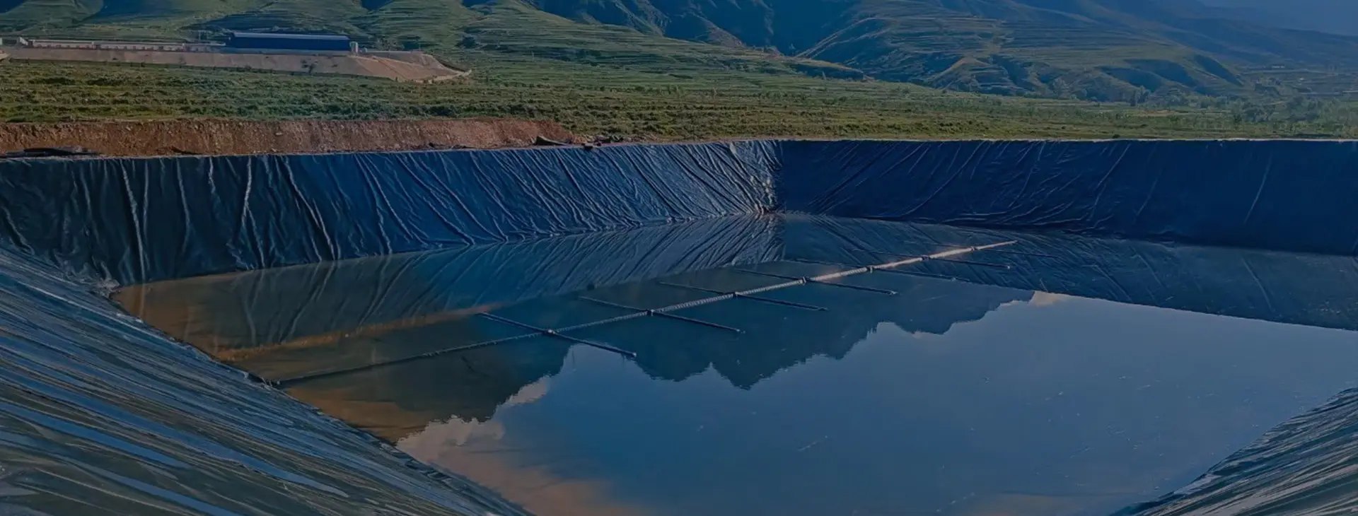 What is the function of laying geomembrane in a landfill